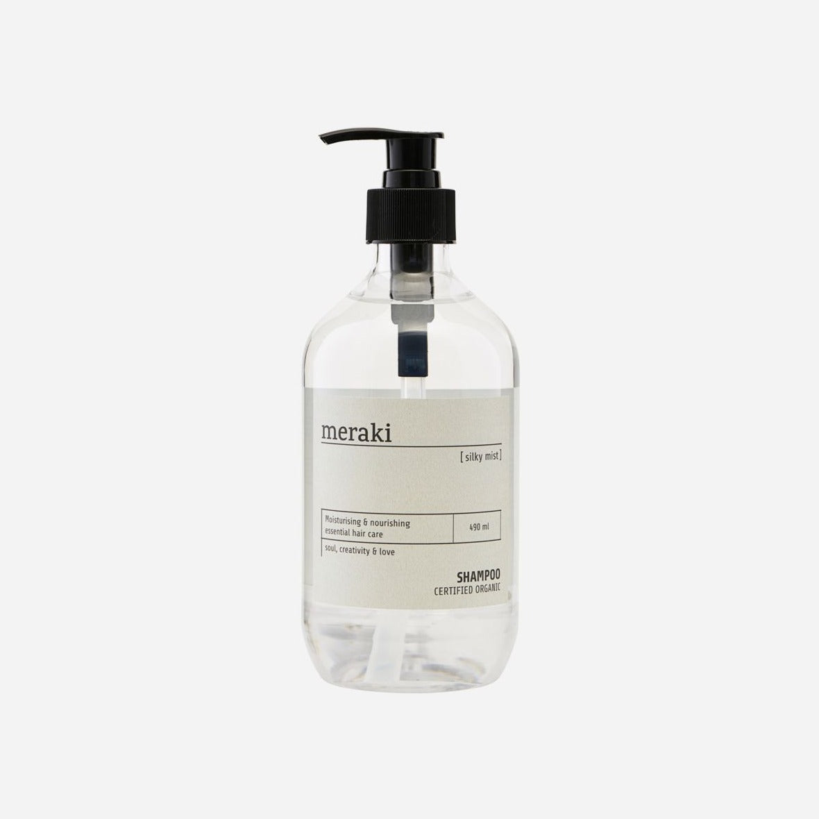 shampoo in a clear glass bottle