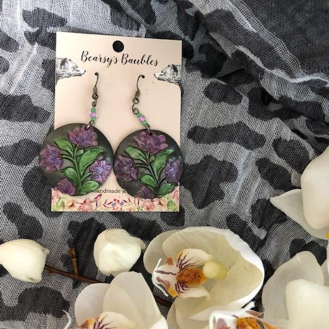 artsy earrings with green and purple metallic paint 